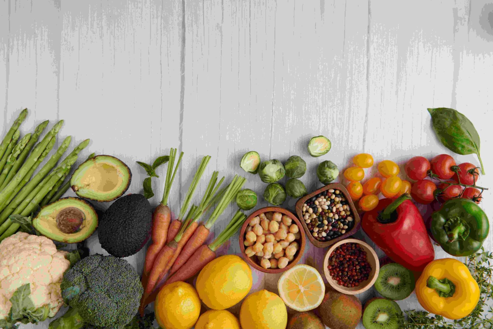 Hacer click en la imagen para ir a la sección del servicio de nutrición deportiva. Se muestran alimentos saludables vistos desde arriba.